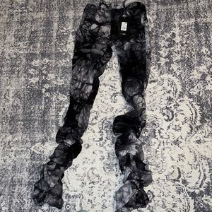 Fashion nova “lots in these words tie dye stacked pants”